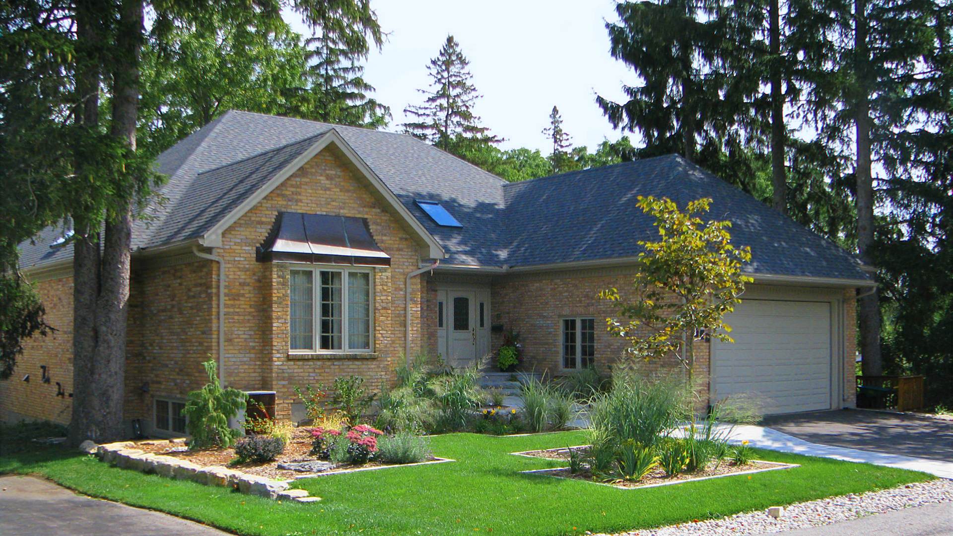 After photo: front yard landscape redesign. A landscaping project in London Ontario.