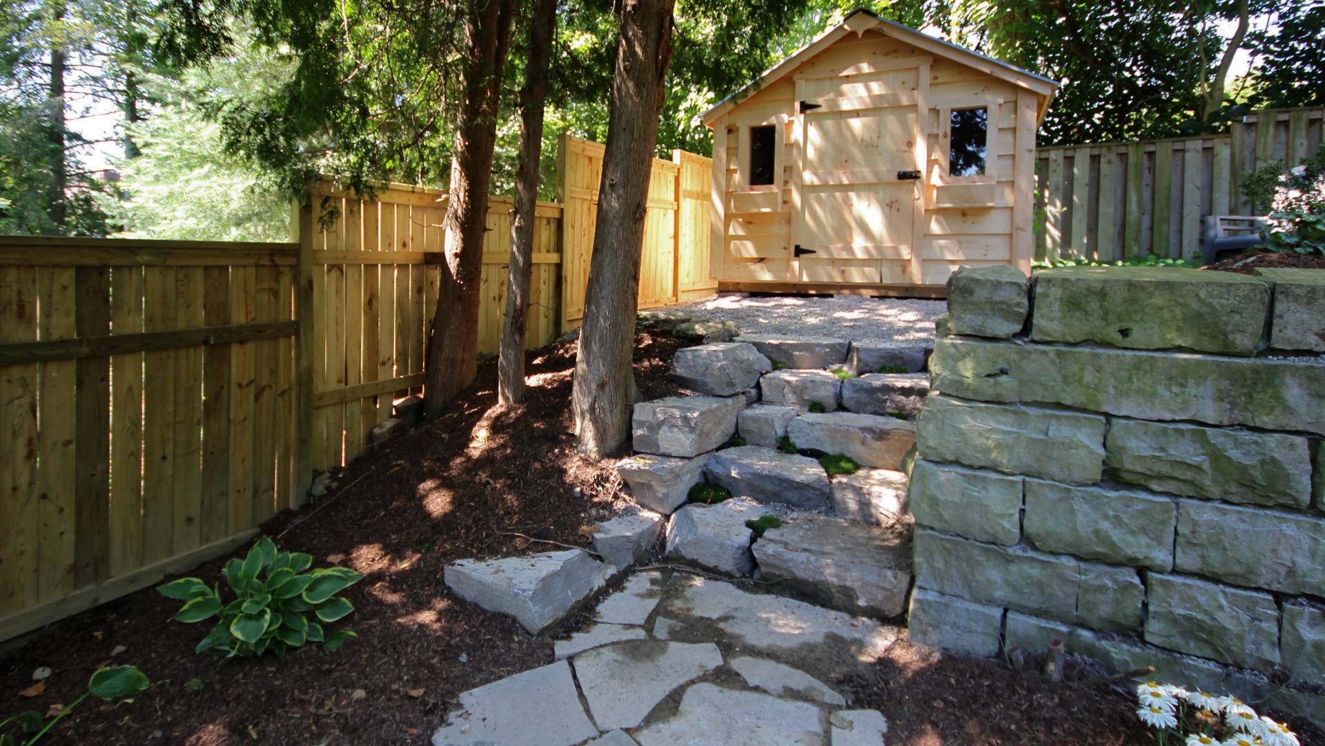 Landscaping / hardscaping project in London Ontario: natural stone steps.